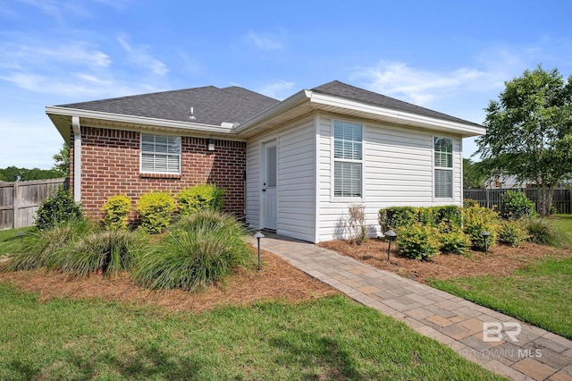 129 Oakwood Ave, Fairhope, AL 36532 - bungalow with brick siding and roof with shingles