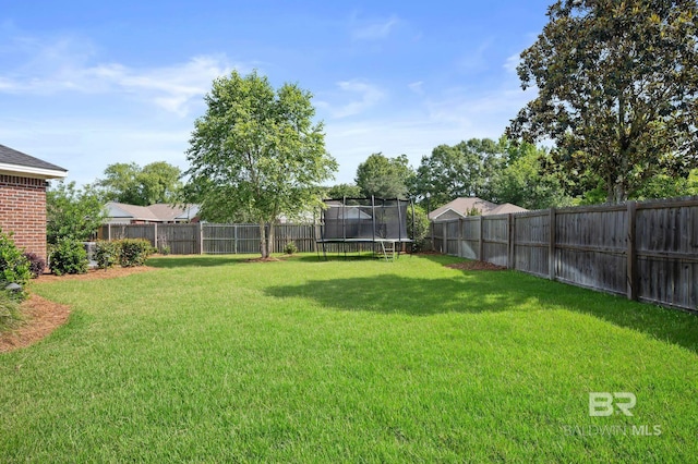 129 Oakwood Ave, Fairhope, AL 36532 - view of yard featuring a trampoline