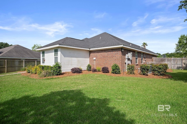 129 Oakwood Ave, Fairhope, AL 36532 - rear view of property with brick siding