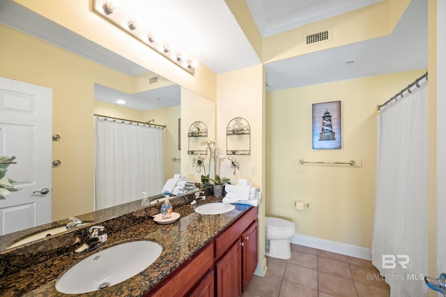 full bathroom with toilet, tile patterned flooring, visible vents, and a sink