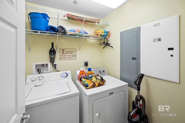 laundry area with laundry area and washing machine and clothes dryer