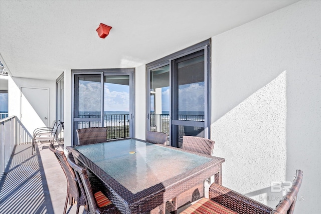 balcony featuring outdoor dining area