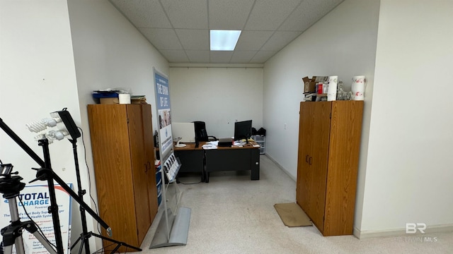 office with a paneled ceiling