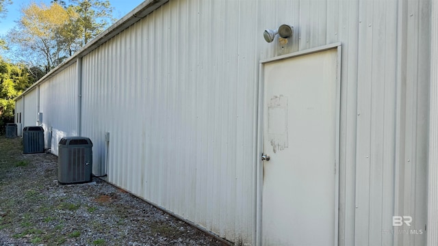 view of home's exterior with central AC