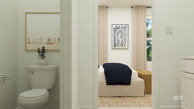 bathroom with tile patterned floors and toilet