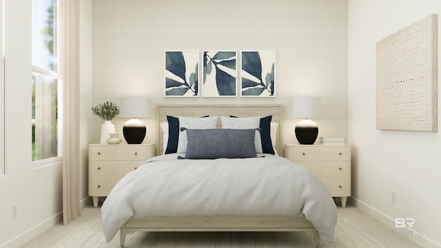 carpeted bedroom with baseboards
