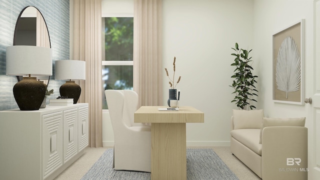 sitting room with light colored carpet and baseboards