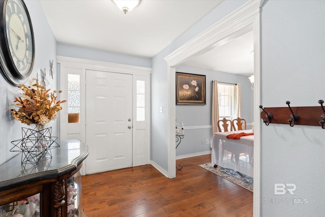 foyer featuring dark hardwood / wood-style floors