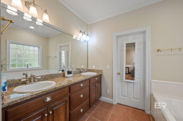 bathroom featuring vanity, crown molding, tile patterned floors, and a bath