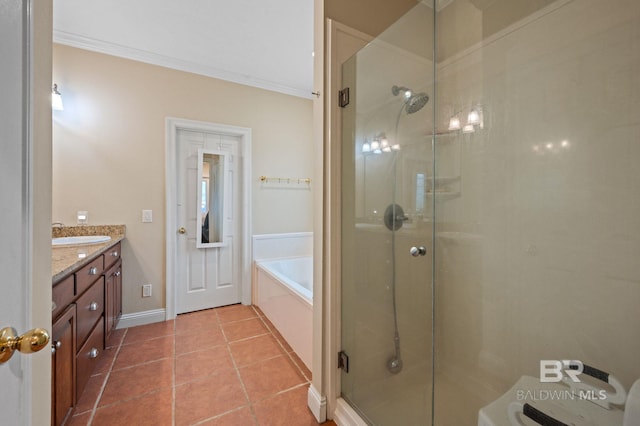 bathroom featuring vanity, crown molding, tile patterned flooring, and plus walk in shower