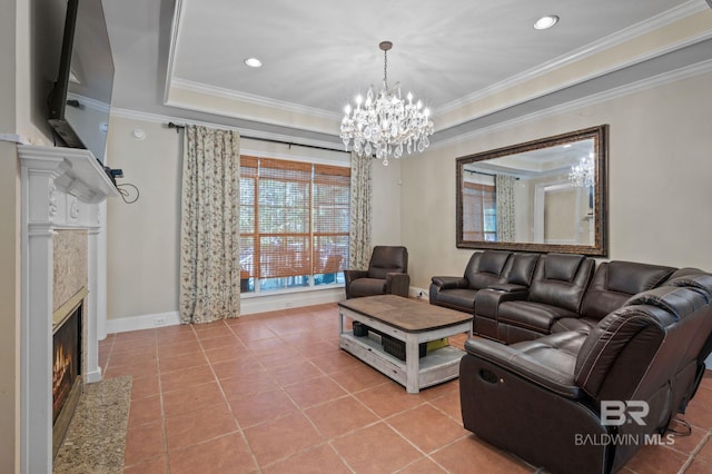 tiled living room with a premium fireplace, ornamental molding, and a chandelier