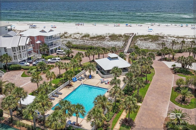 bird's eye view featuring a beach view and a water view