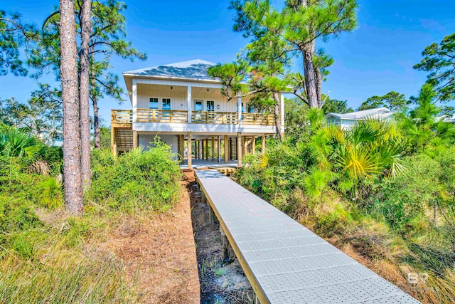 rear view of house with a carport