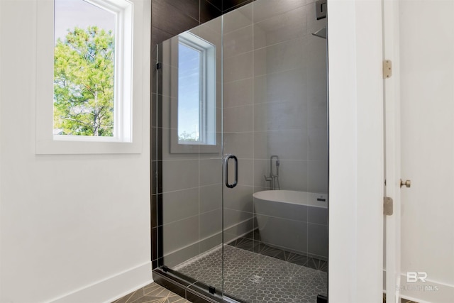 bathroom with a shower stall