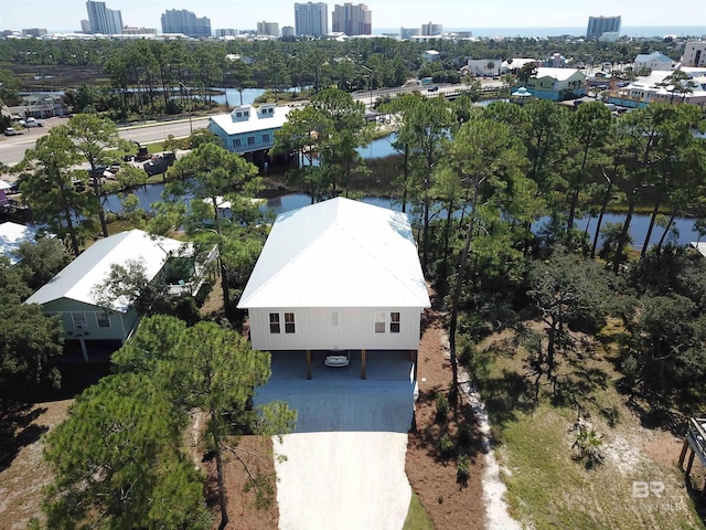 aerial view featuring a water view and a view of city