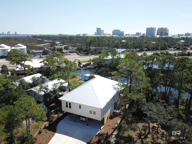 bird's eye view with a view of city and a water view