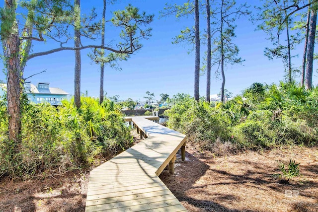 surrounding community with a boat dock