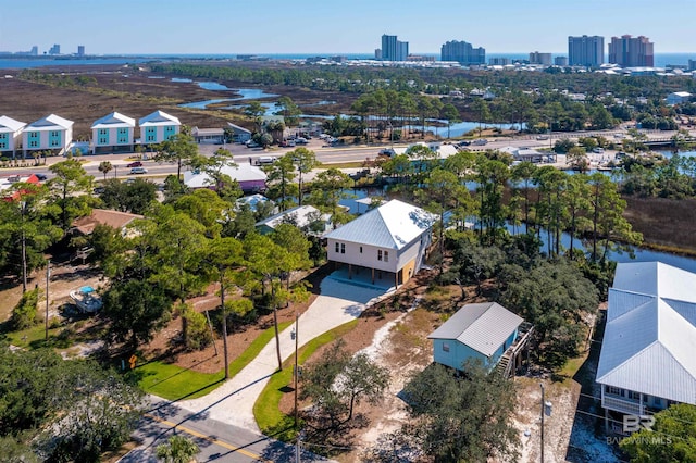 bird's eye view featuring a water view and a view of city