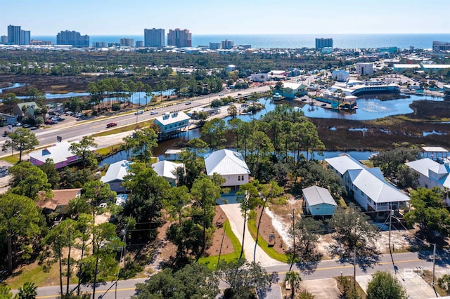 bird's eye view featuring a city view and a water view