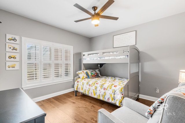 bedroom featuring ceiling fan and hardwood / wood-style flooring