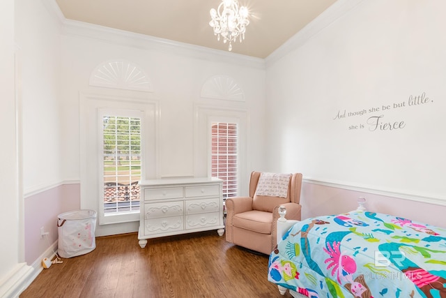 bedroom with ornamental molding, a chandelier, and hardwood / wood-style flooring