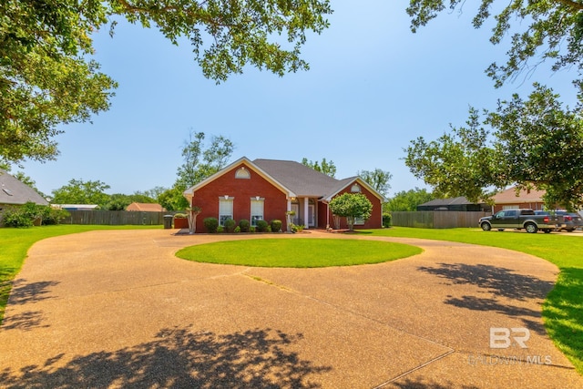 ranch-style house with a front lawn