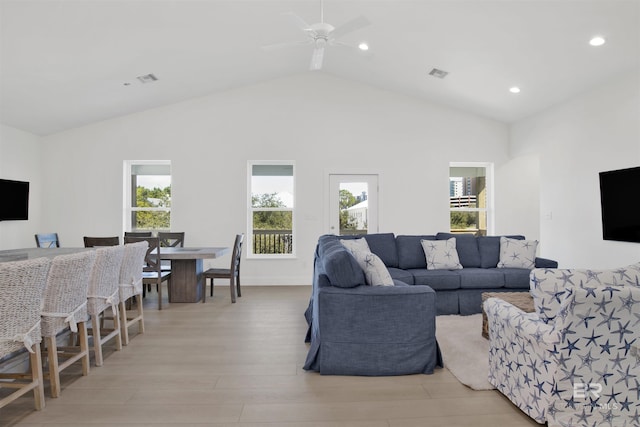 living room with recessed lighting, a ceiling fan, baseboards, visible vents, and light wood-type flooring