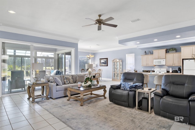 living area with light tile patterned floors, recessed lighting, visible vents, crown molding, and ceiling fan with notable chandelier