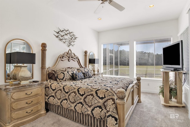 bedroom featuring baseboards, recessed lighting, a ceiling fan, and light colored carpet