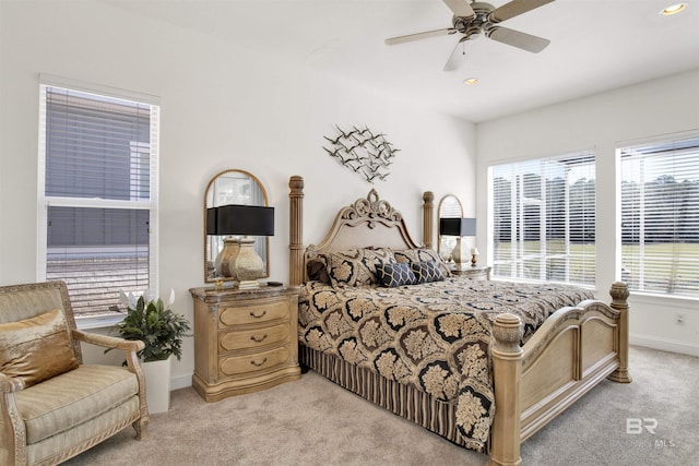 bedroom featuring light carpet, recessed lighting, a ceiling fan, and baseboards