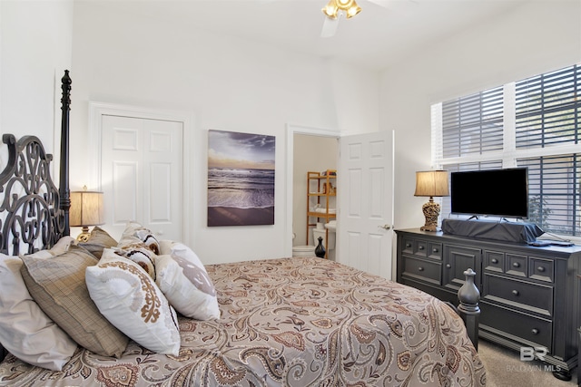 carpeted bedroom featuring ceiling fan