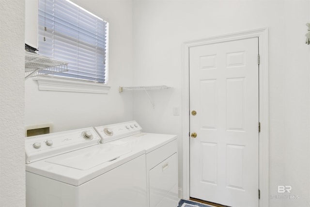 washroom with laundry area and washing machine and clothes dryer