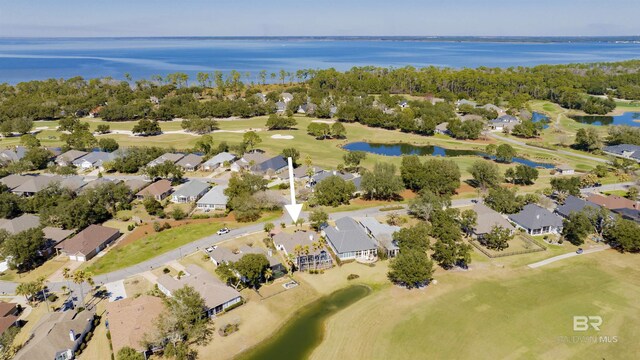 bird's eye view with golf course view, a water view, and a residential view