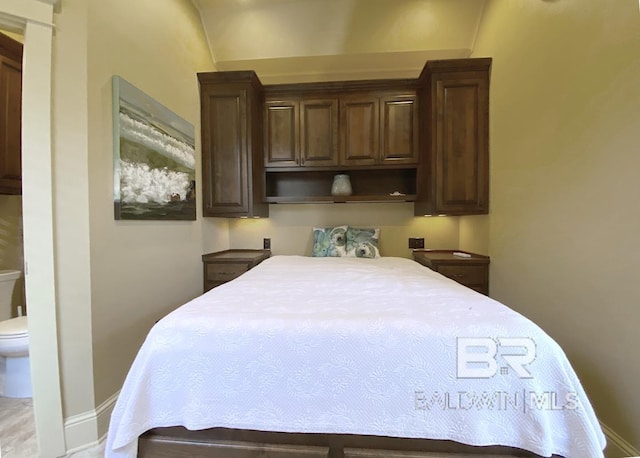 bedroom with baseboards