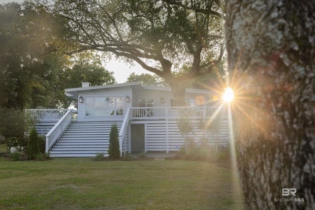 7068 Camellia Dell Ln, Foley, AL 36535 - rear view of house with stairs, a yard, and a deck