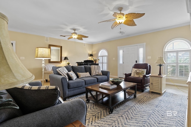 tiled living room with crown molding and ceiling fan