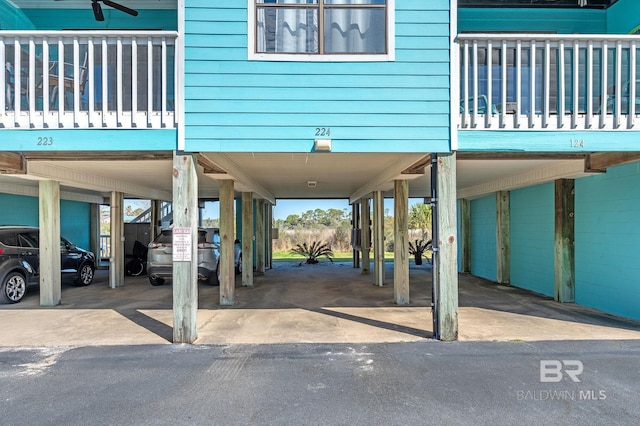 exterior space with a carport