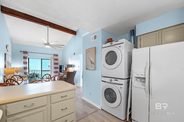 washroom featuring a ceiling fan, visible vents, light wood finished floors, laundry area, and stacked washer and dryer