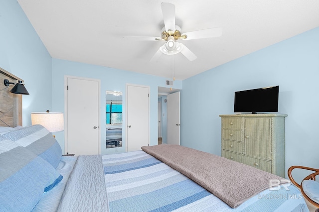 bedroom with visible vents and a ceiling fan