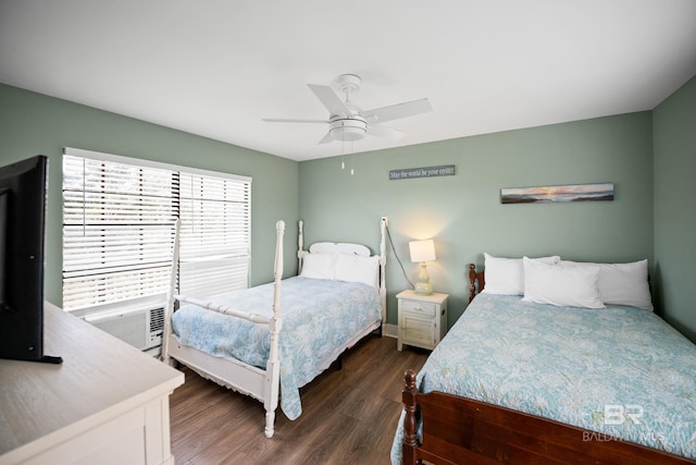 bedroom with wood finished floors and a ceiling fan