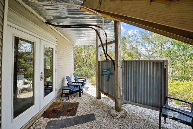 view of patio featuring french doors