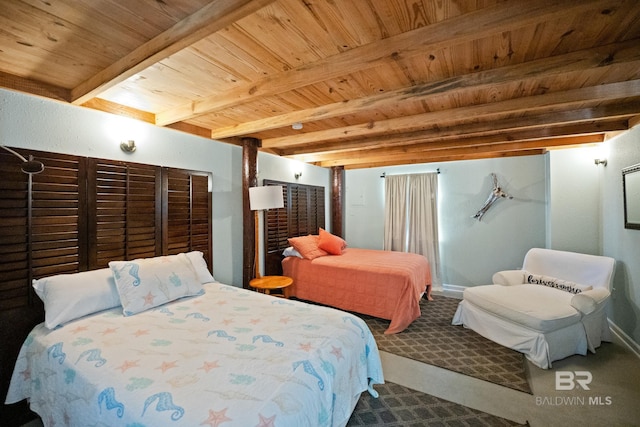 bedroom featuring wooden ceiling, beam ceiling, and carpet flooring