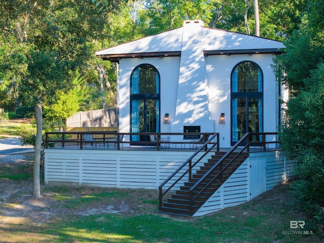 view of outbuilding with french doors