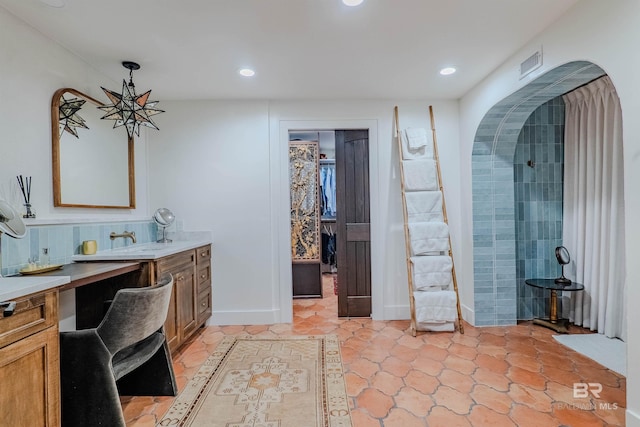 bathroom featuring vanity and tile patterned floors