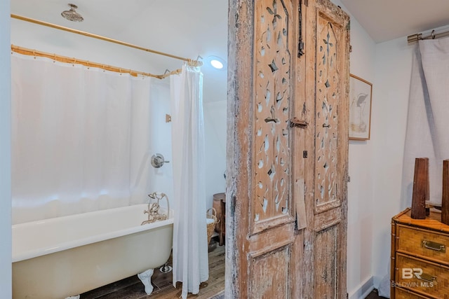 bathroom featuring hardwood / wood-style flooring