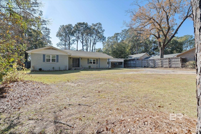 back of house with a yard