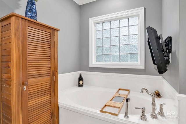 bathroom with a washtub