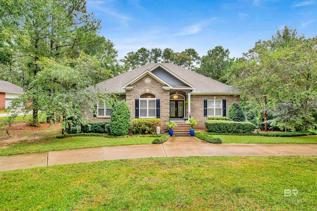 view of front of home with a front yard