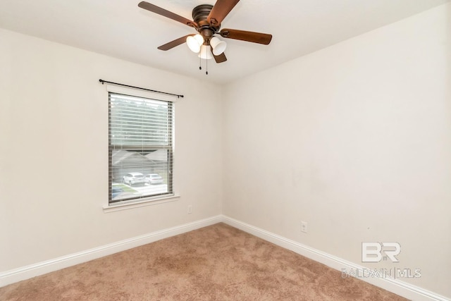 carpeted empty room with ceiling fan