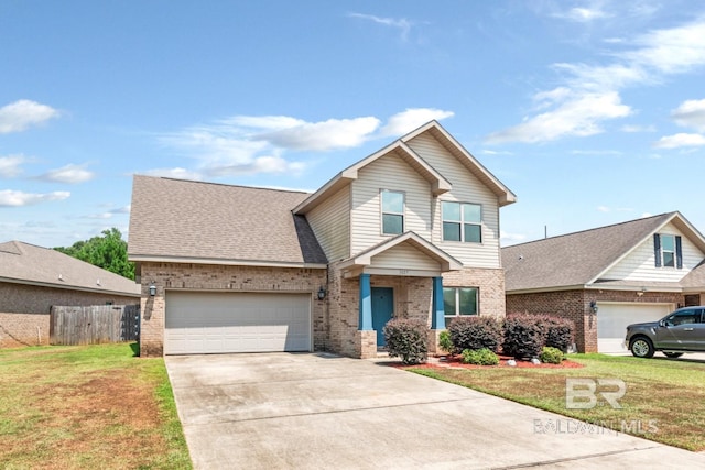 view of front of house featuring a garage and a front yard